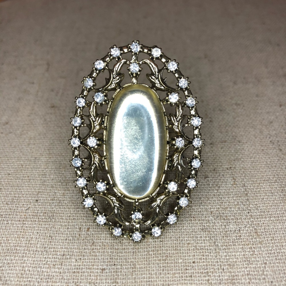 Large Oval Stone Ring surrounded by Pavé CZ